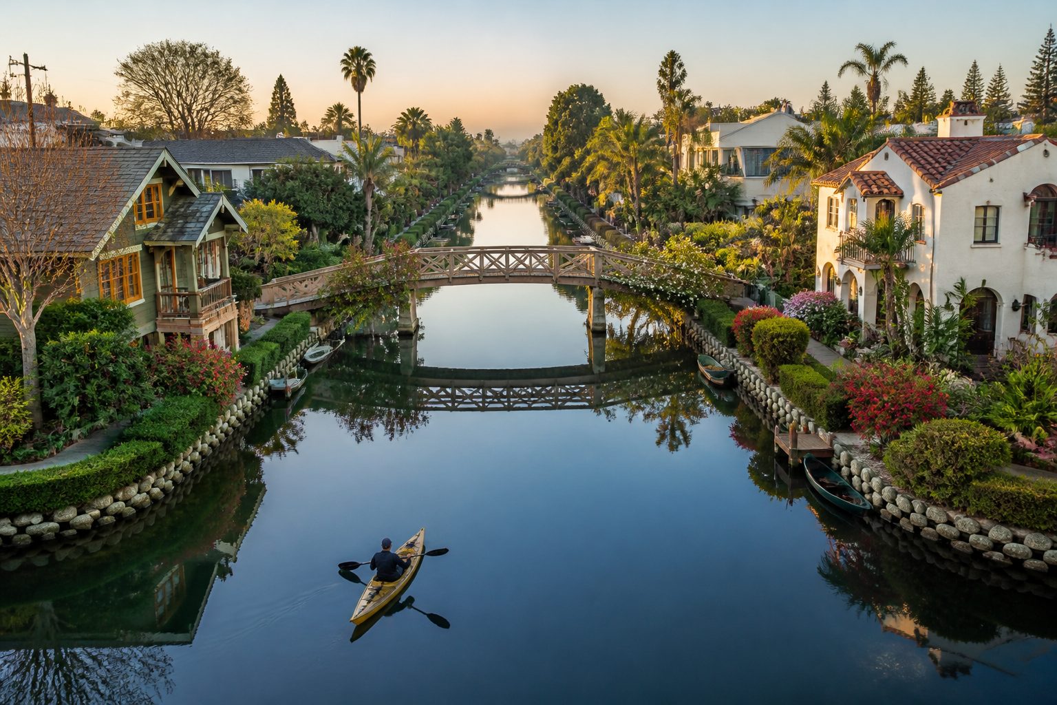 Aerial view of Santa Monica beach, West Hollywood streets, Downtown LA towers, and Venice Beach canals